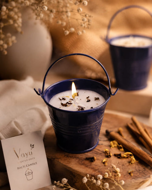 Balti candle, spiced amber wax in a clear glass vessel