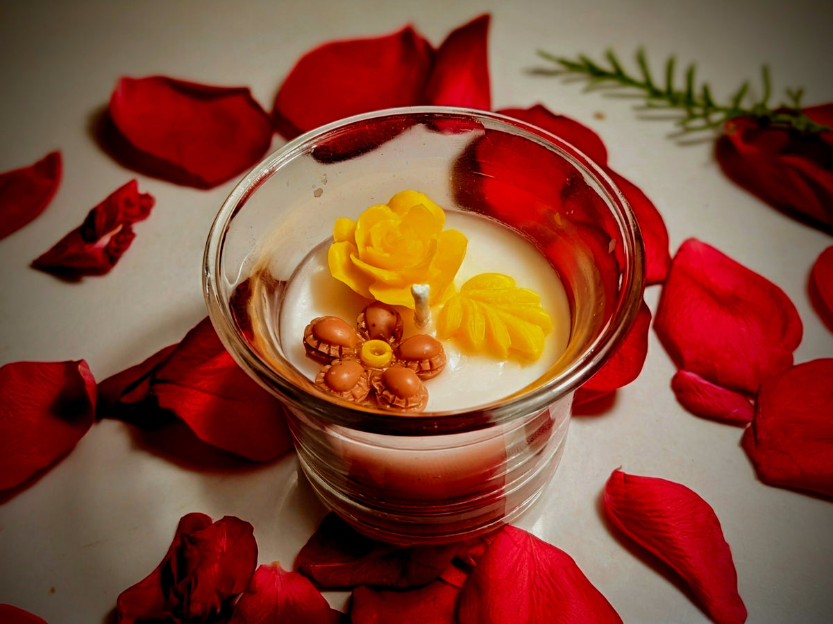 Buttercup candle, yellow wax flower set in clear glass