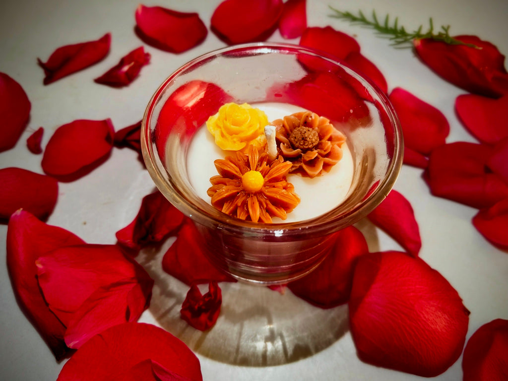 Buttercup candle, yellow wax flower set in clear glass