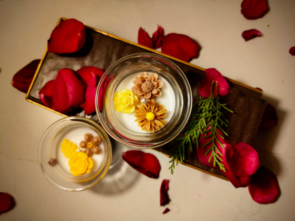 Buttercup candle, yellow wax flower set in clear glass