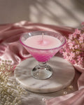 Cocktail candle, pale green wax in a coupe-shaped glass